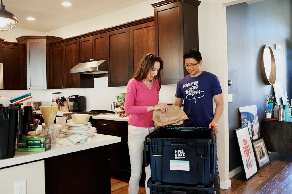 Young couple prepare for moving day