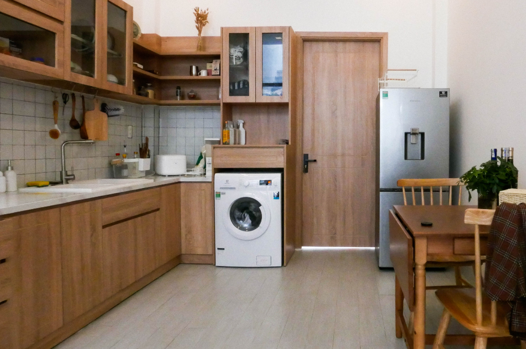 Don't have space for a standalone laundry? Try saving space with a practical kitchen solution